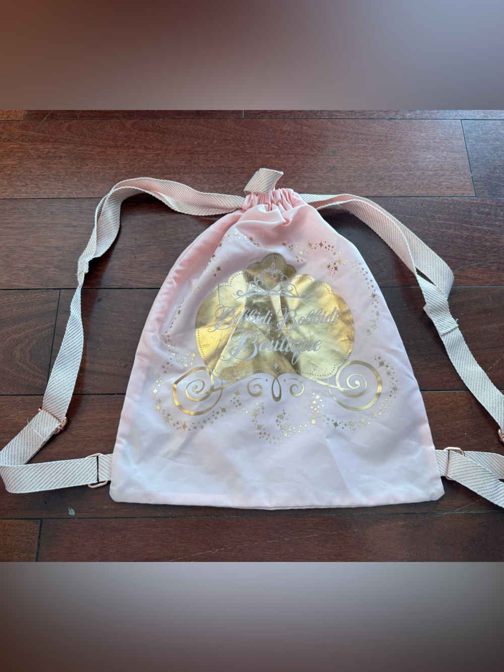 Pink Bibbity Bobbity Boutique Drawstring Backpack with Gold Logo